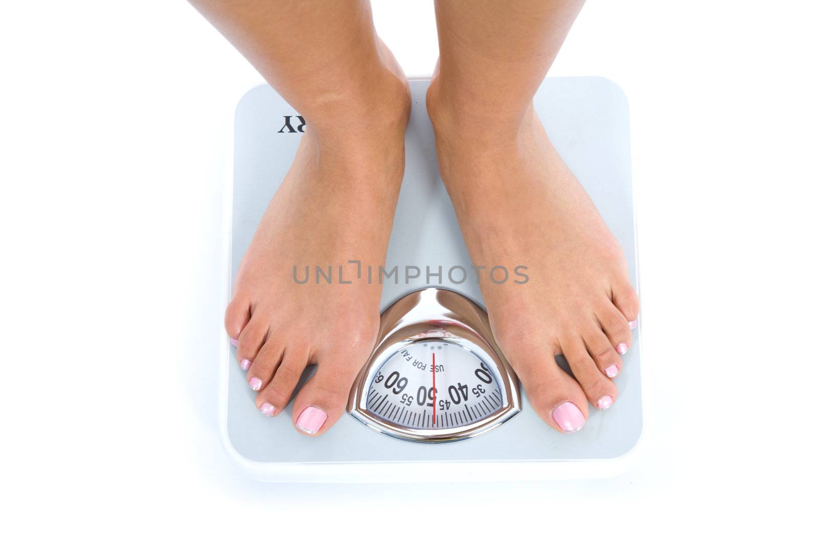Woman legs with  scales on  isolated background