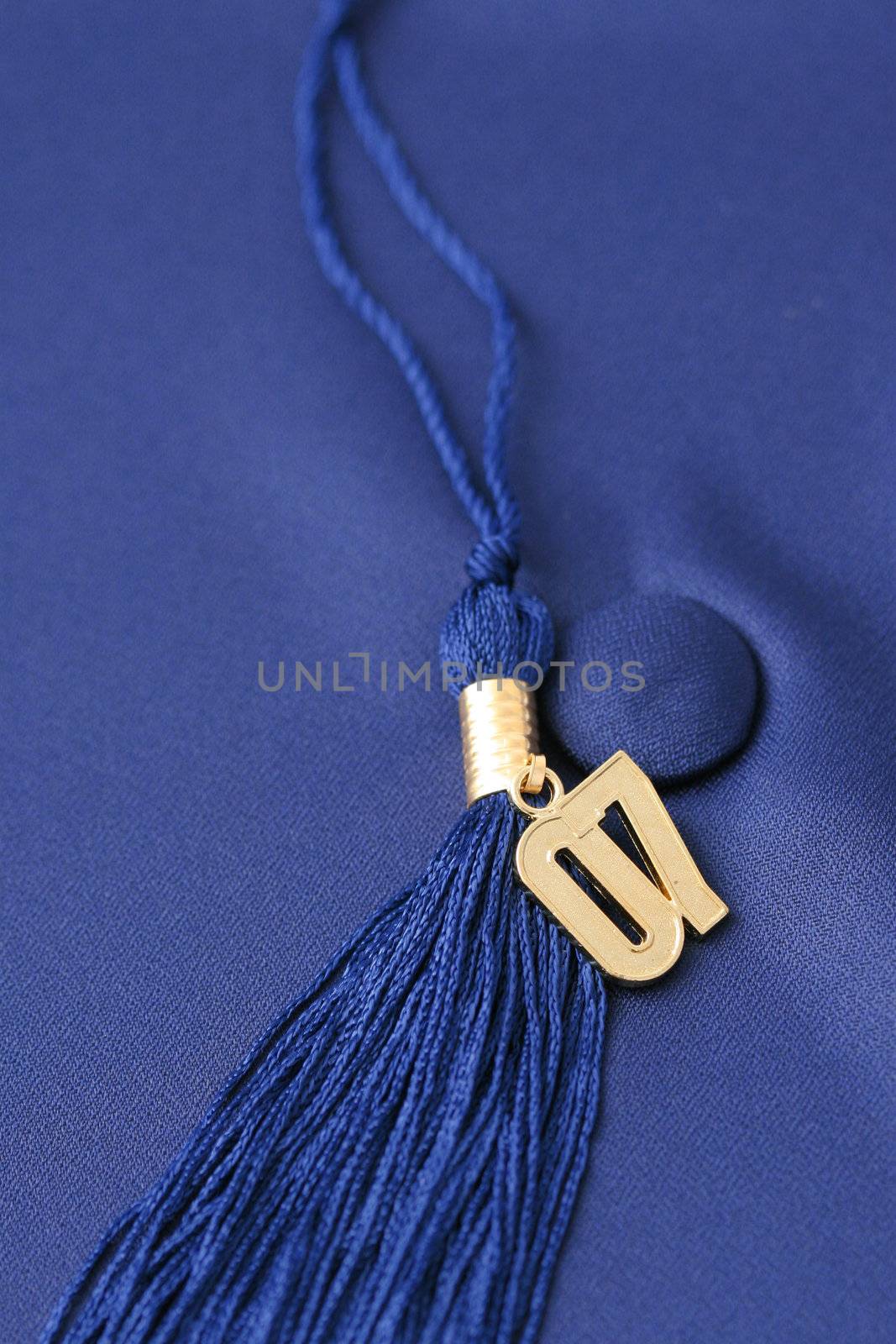 Graduation cap and tassle with a gold '07 attached.
