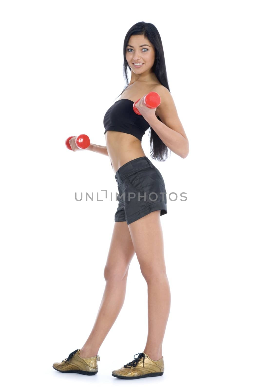 beautiful girl with dumbbells on  isolated background