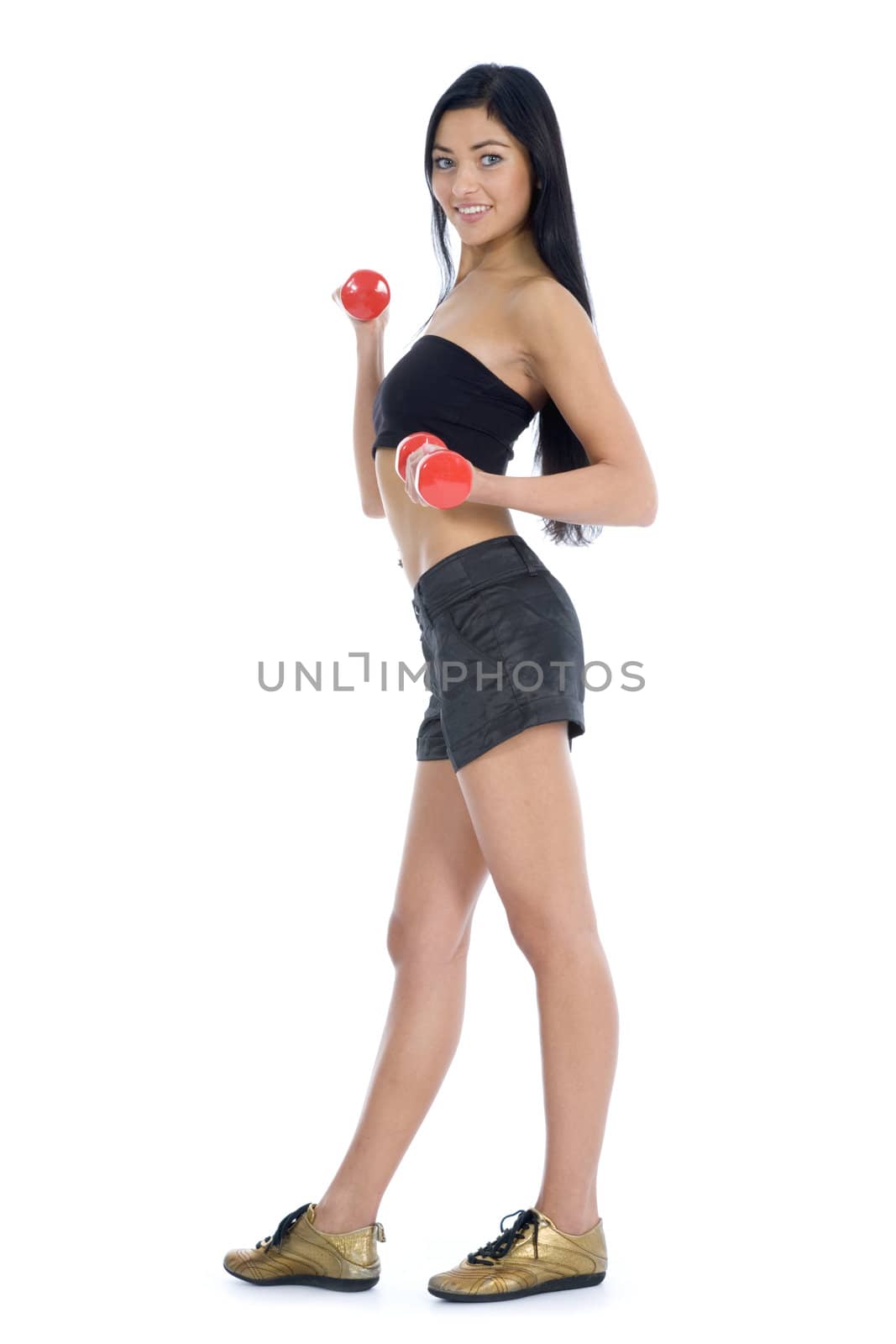 beautiful girl with dumbbells on  isolated background