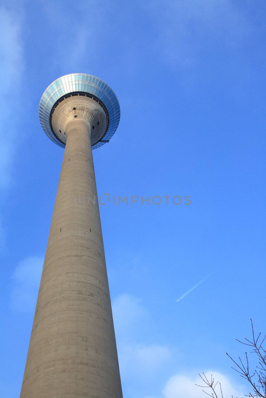 Radio tower in Dusseldord, Germany on blue sky background