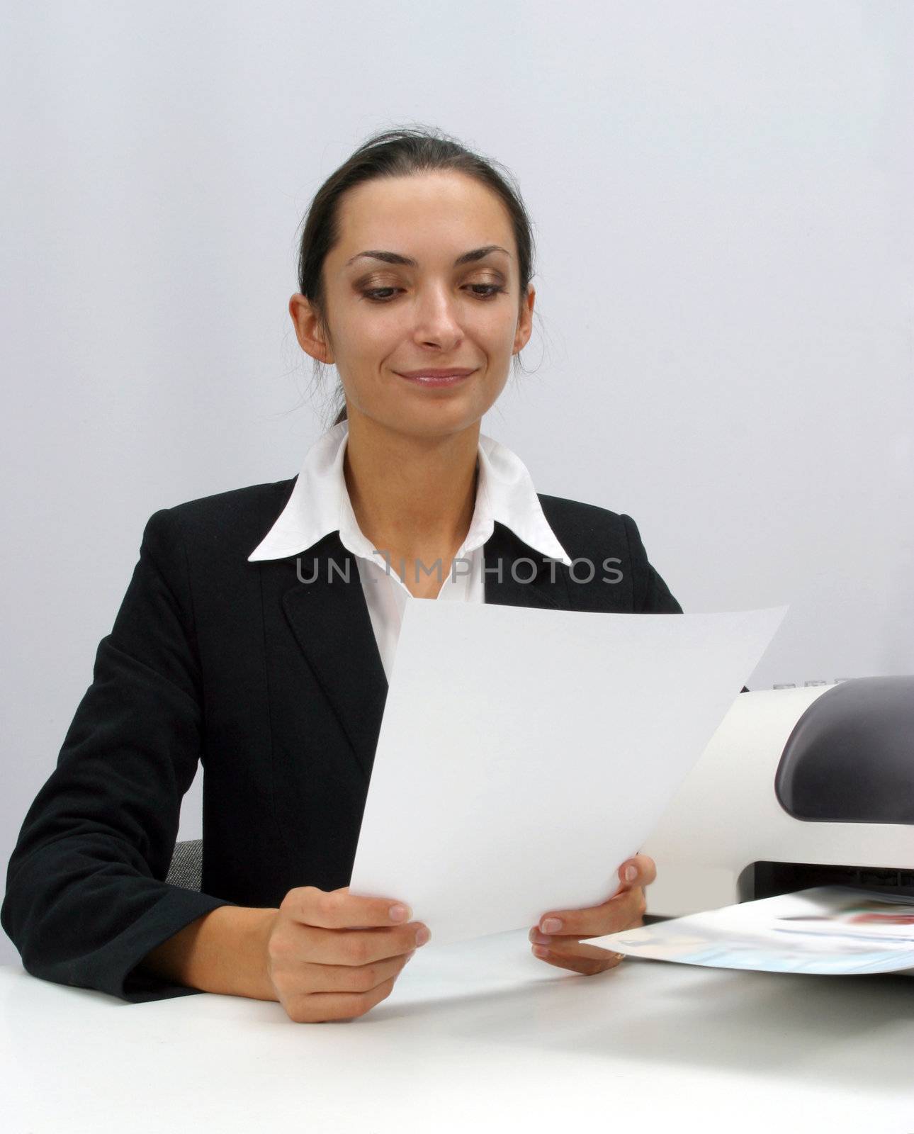 Business woman is printing in office, copy, duplicate, calling