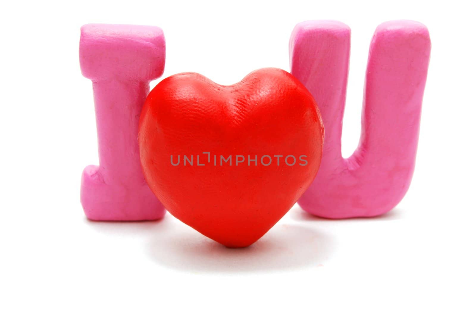 Single Valentine's I Love You Text with Heart Made of Red and Pink Plasticine Isolated on White Background