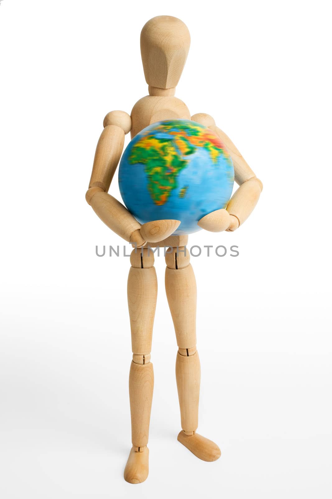 The wooden figure holds Earth.Isolated on white [with clipping path].