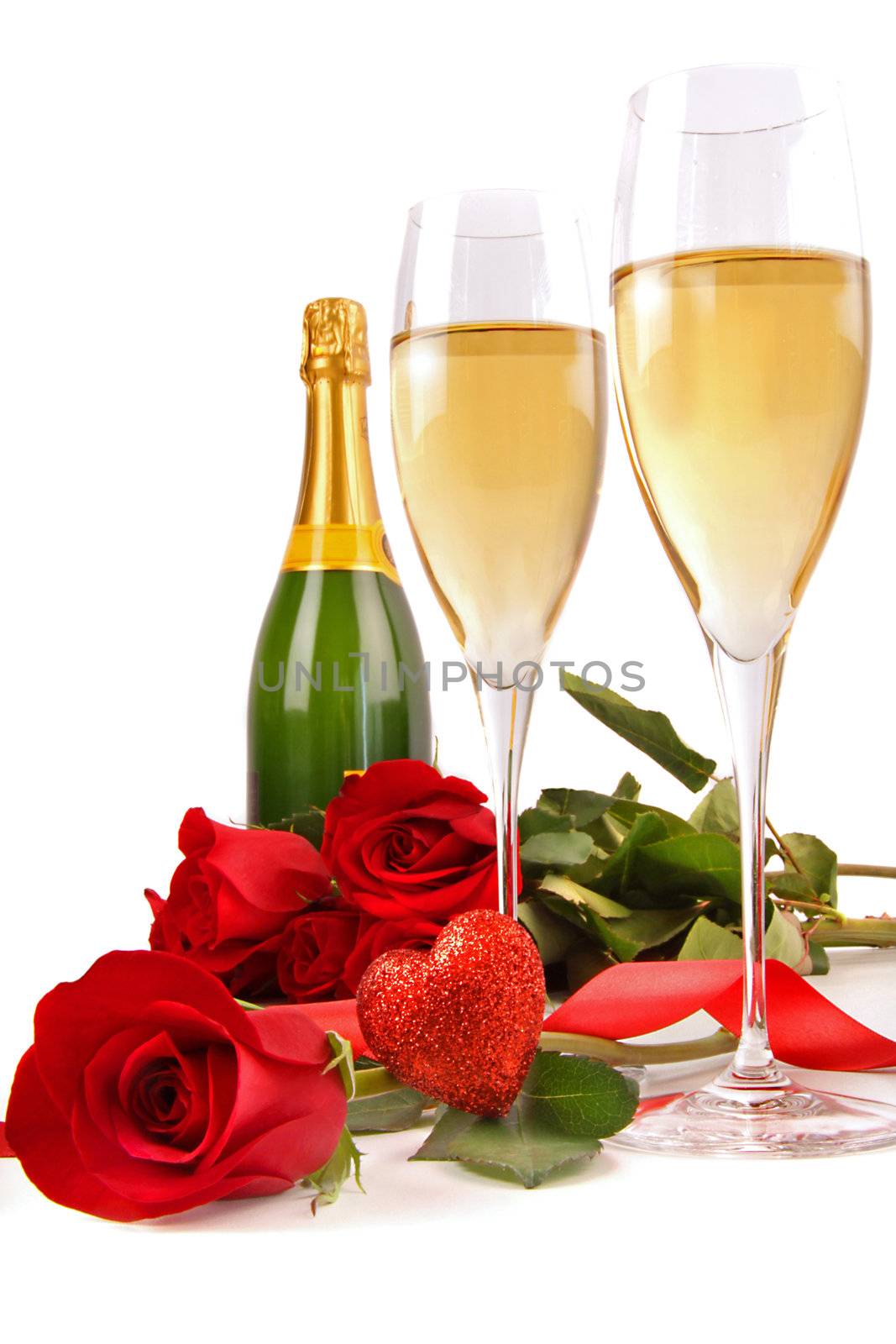 Champagne glasses with red roses and little heart on white