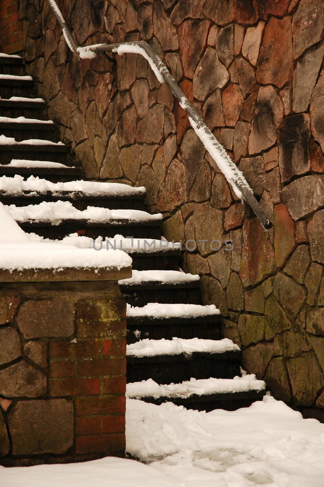 stairs covered by snow, vertically framed shot