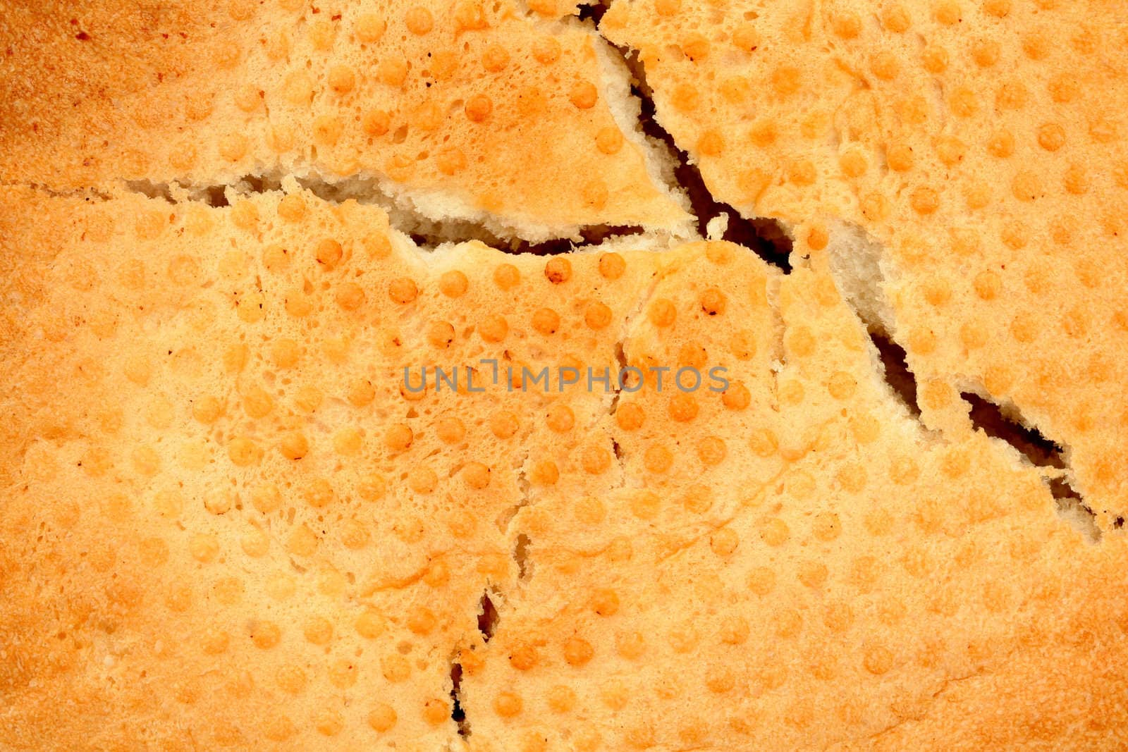 The cracked crust of bread, background