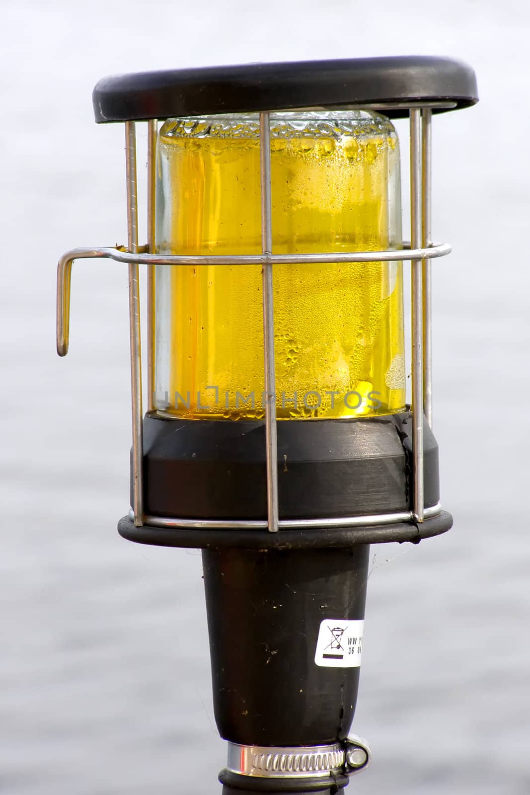 misted over yacht yellow color lantern  overwater