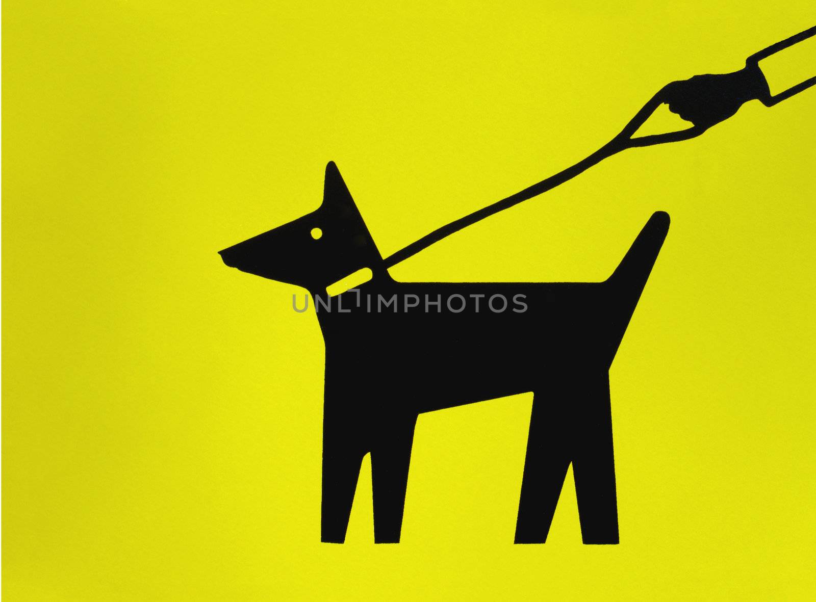 Close up of a painted yellow sign at a nature reserve signifying that dogs should be kept on the lead.