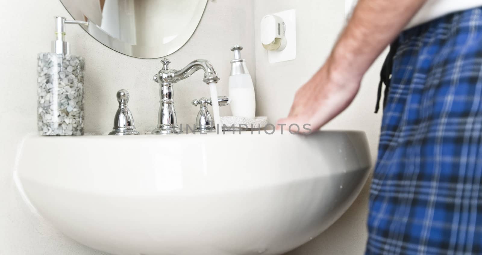 Sink with Water Running From Faucet by cardmaverick