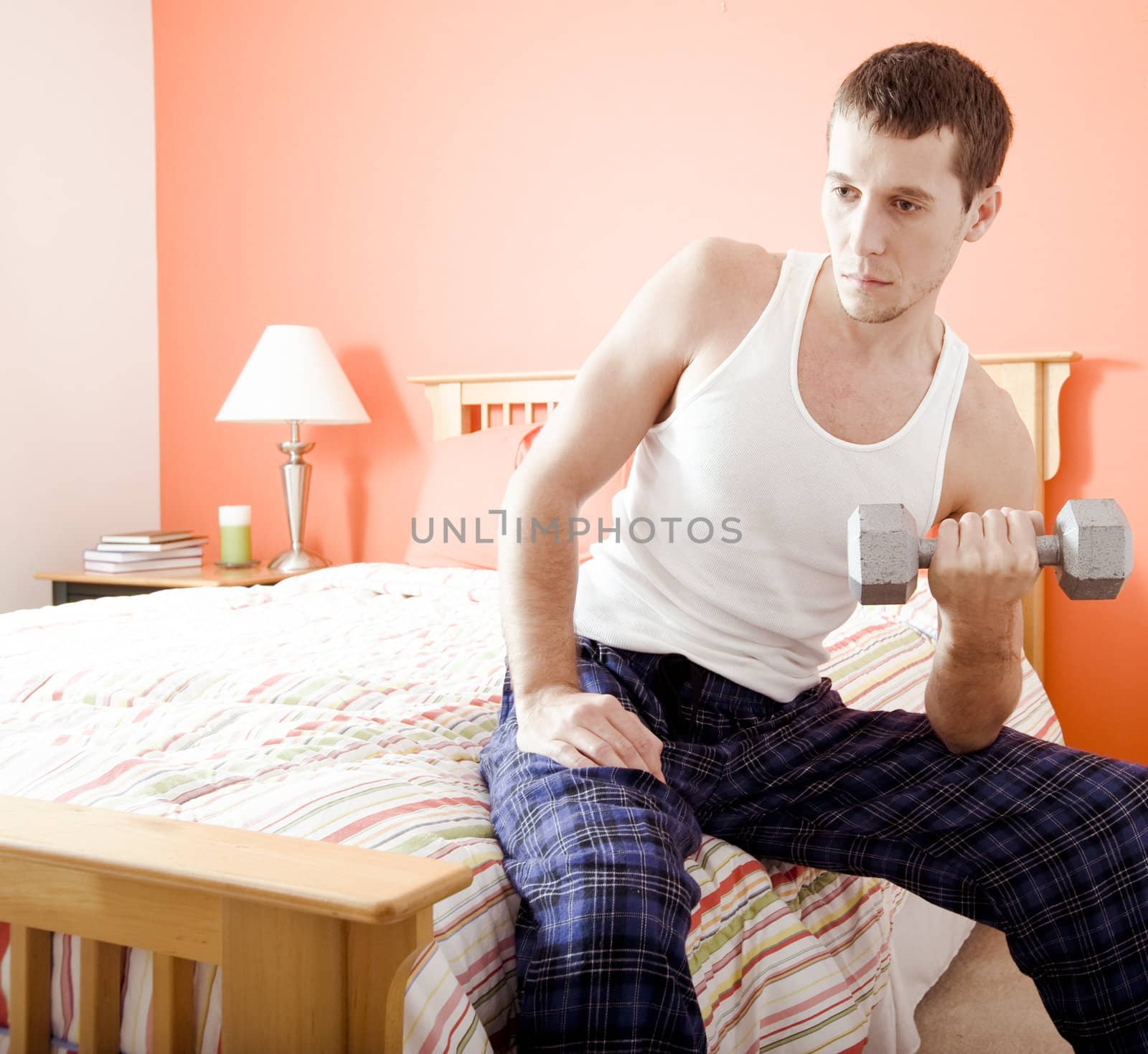 Man Using Arm Weight in Bedroom by cardmaverick