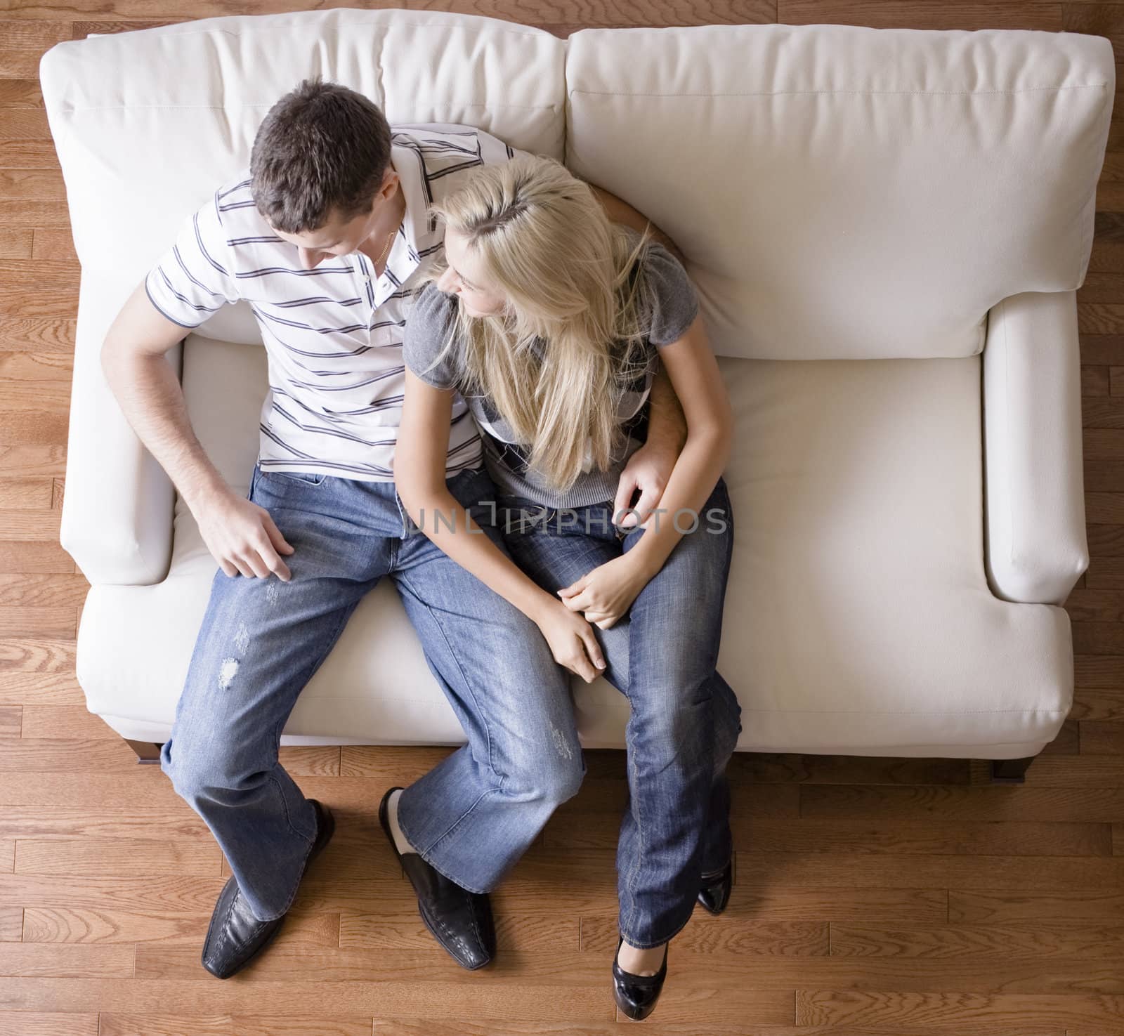 Overhead View of Couple on Love Seat by cardmaverick