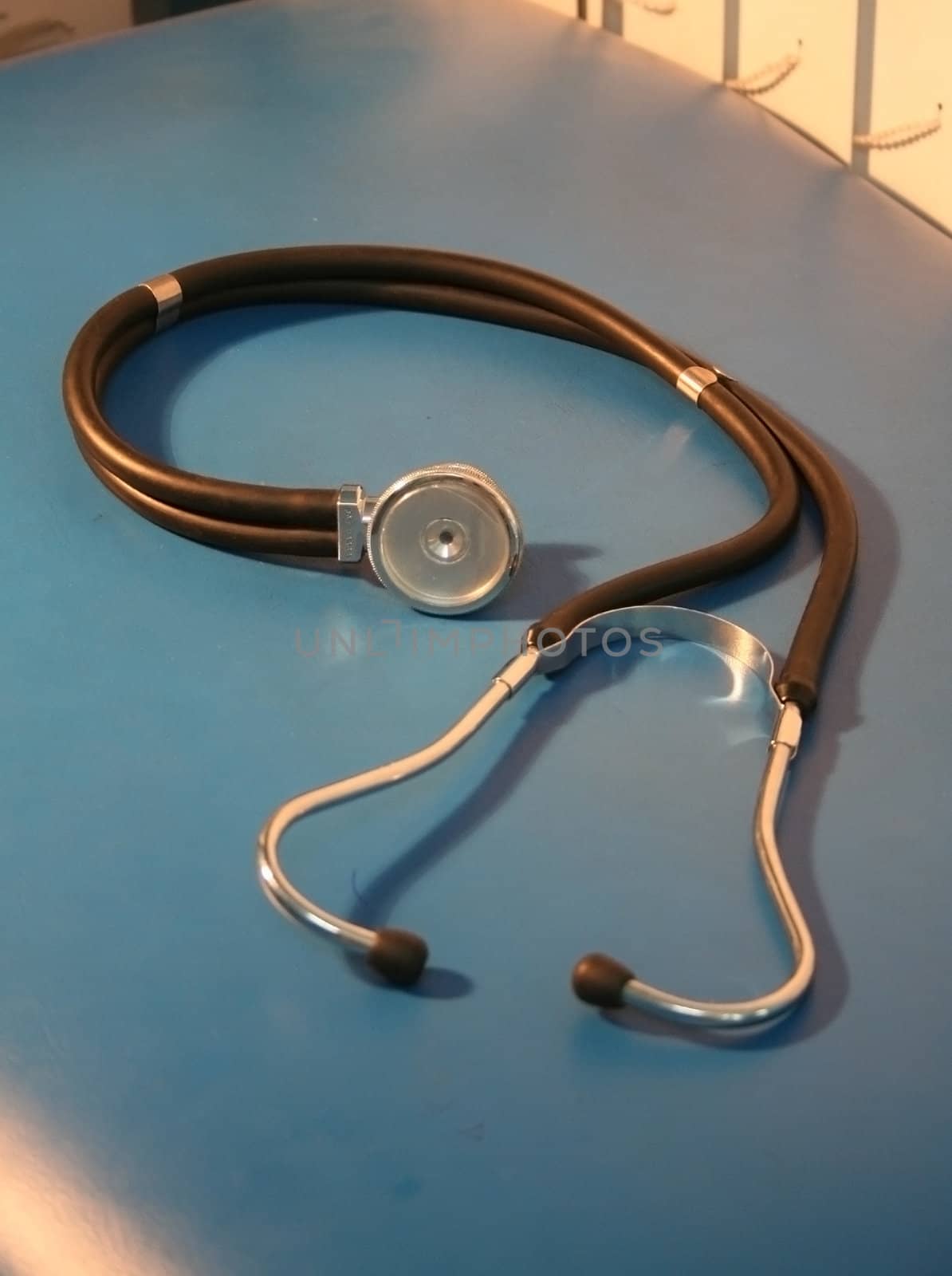 stethoscope on blue table