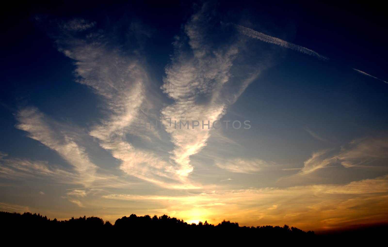 the sunset with lines of planes by renales