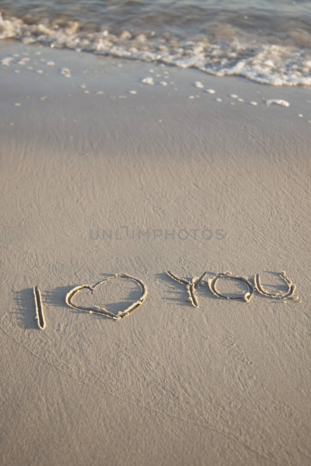 Text written on beach