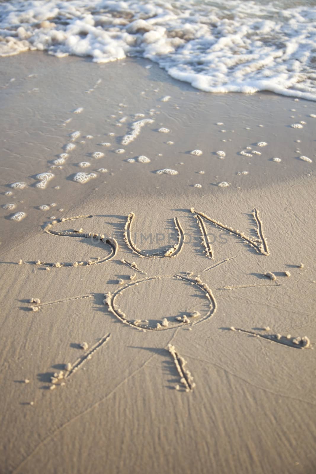 Text written on beach