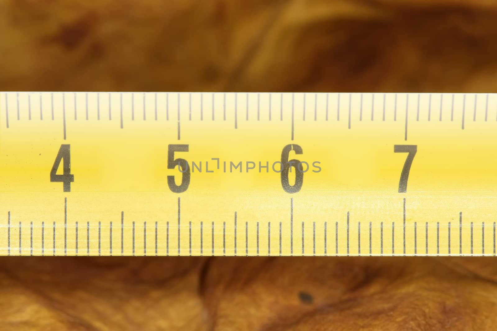 Metal yellow meter showing numbers 4 through 7