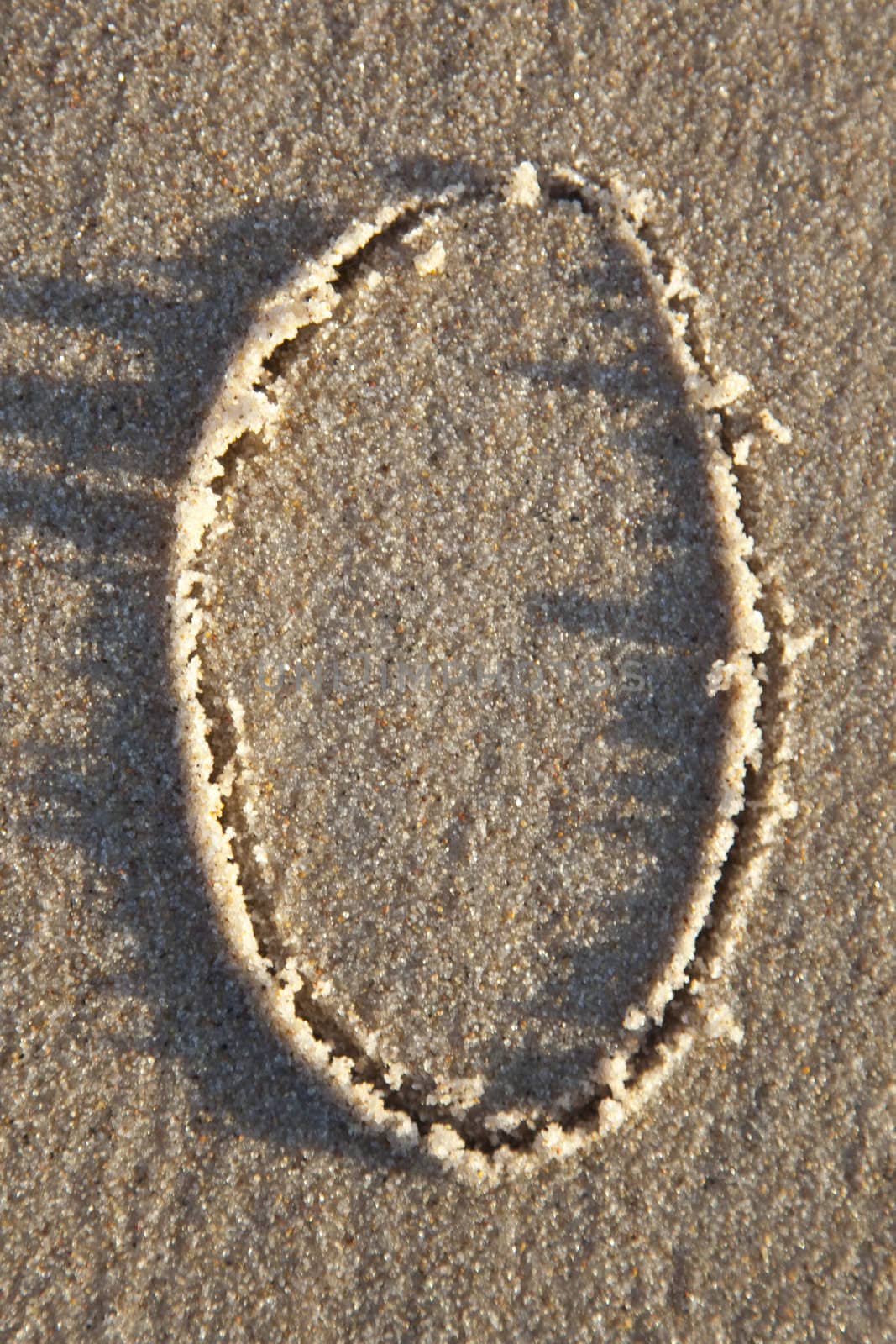 Letter on wet sand