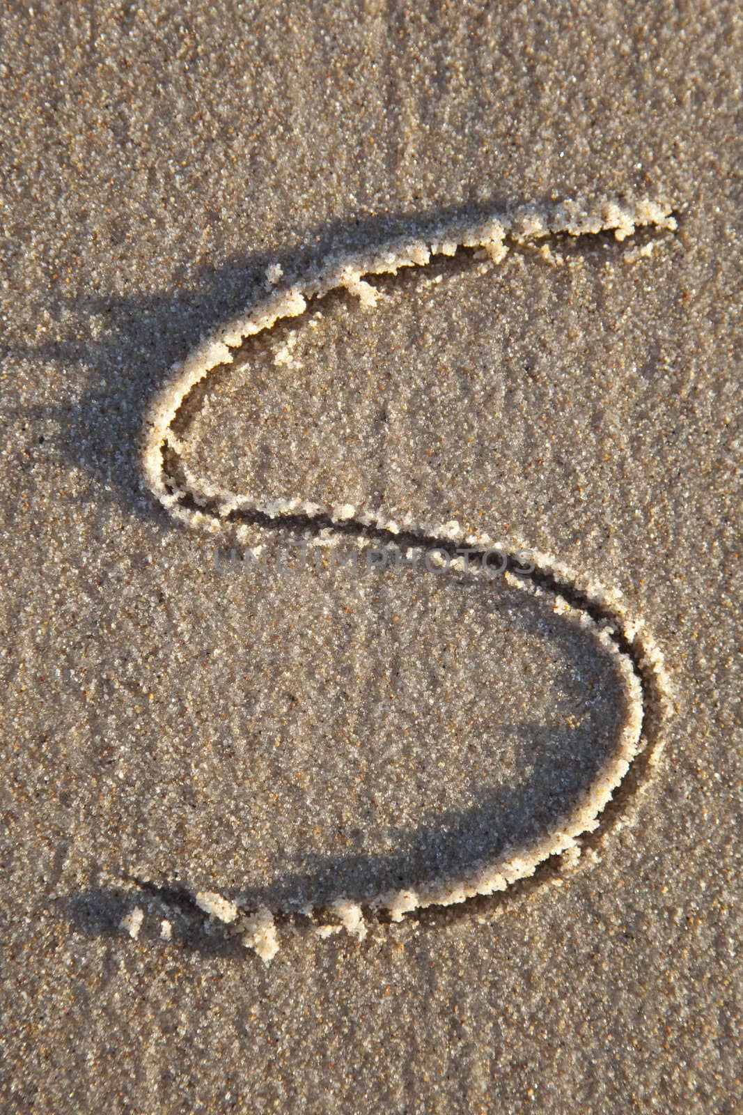 Letter on wet sand by shiffti