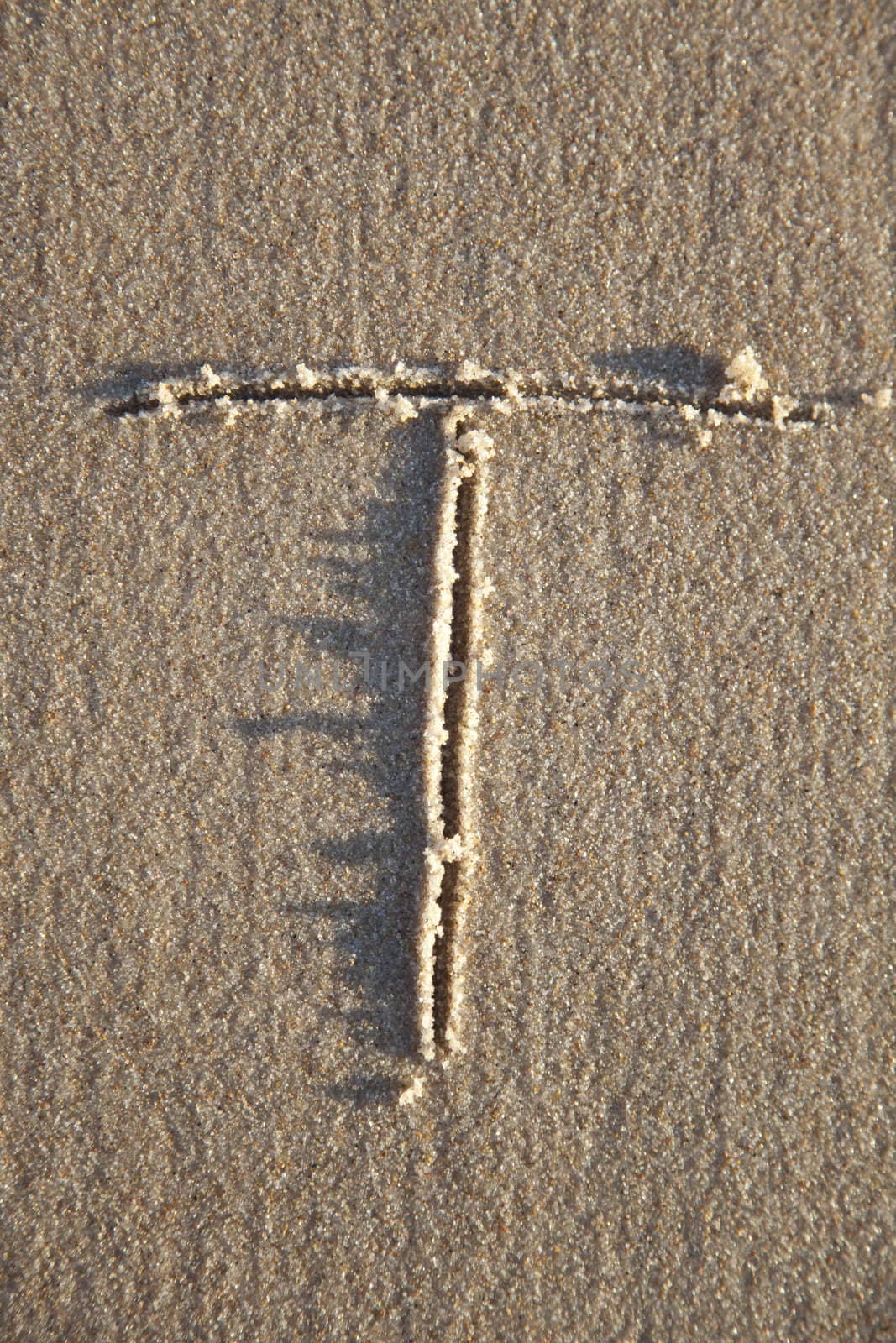 Letter on wet sand