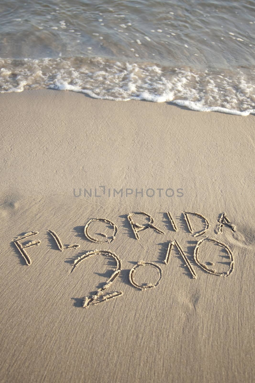 Text written in the beach by shiffti