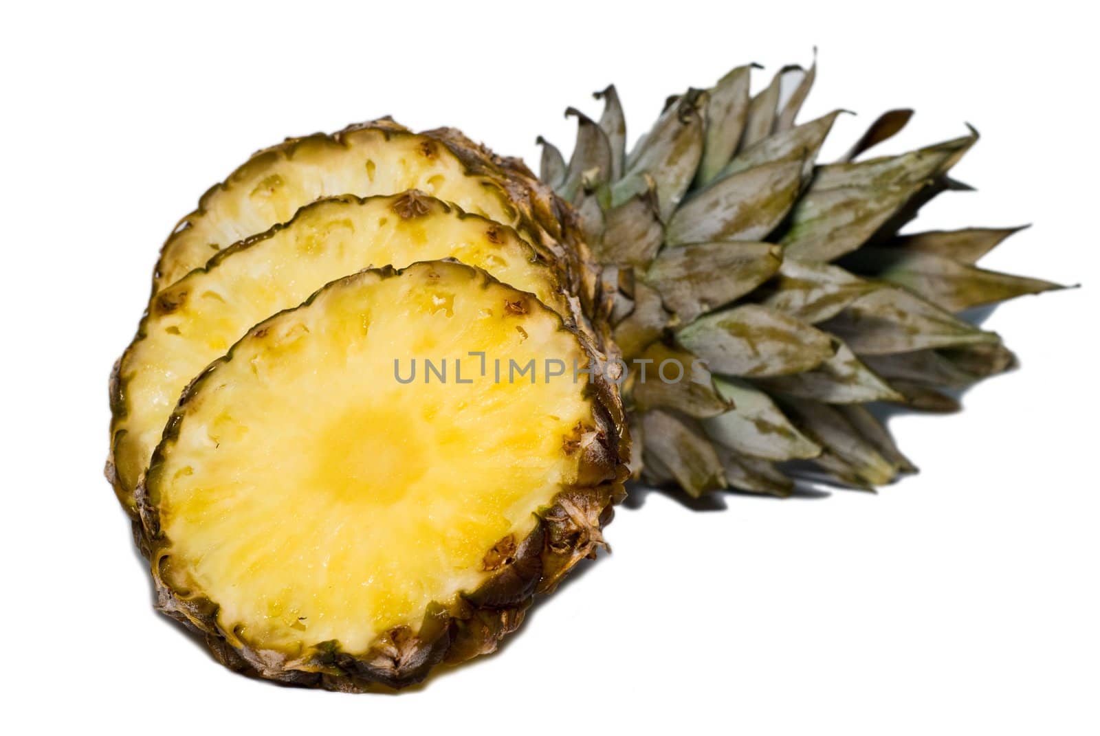 cut into slices pineapple on a white background