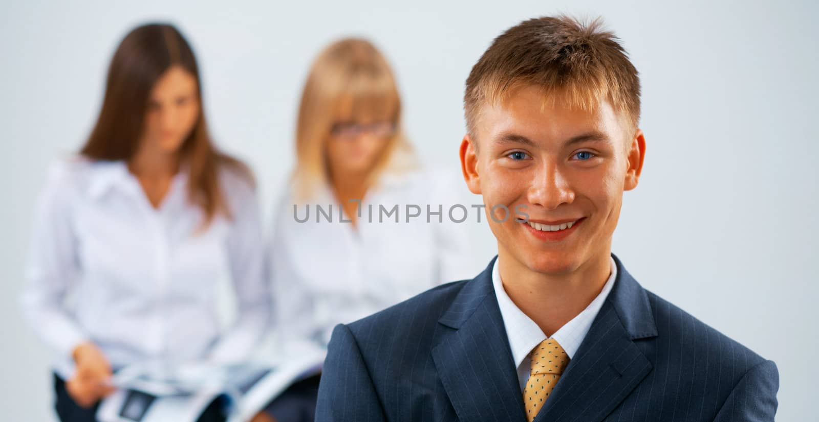 Portrait of young happy businessmen 