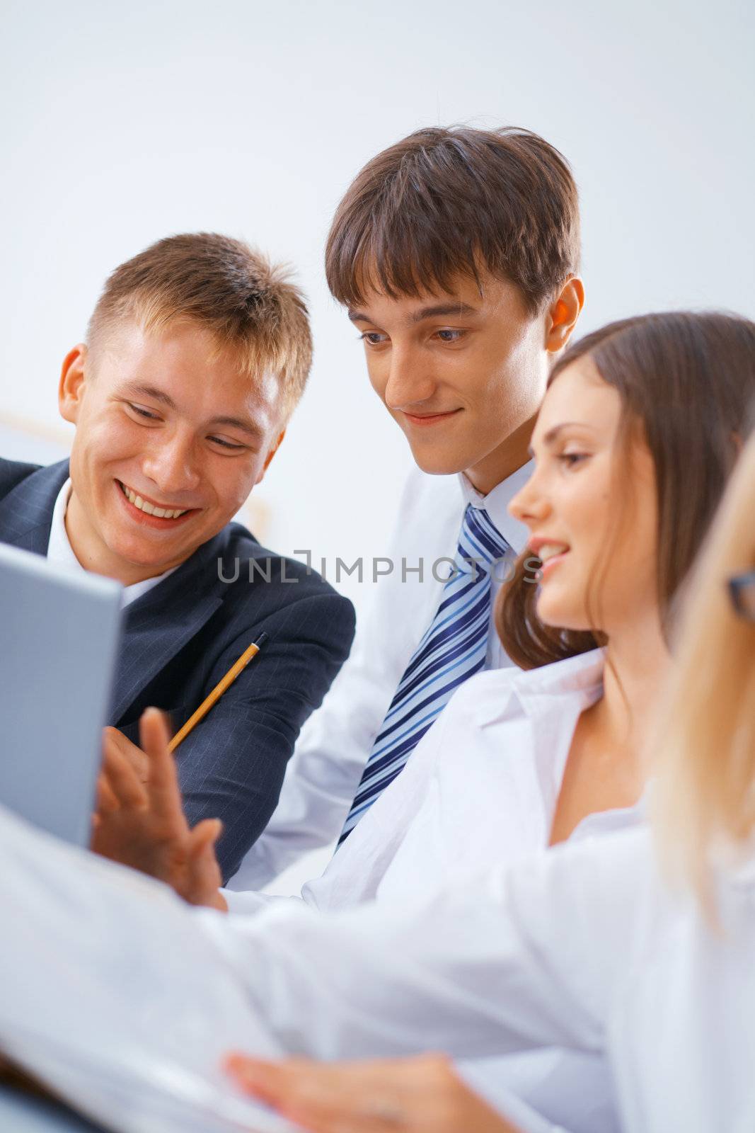 Portrait of young happy working business team