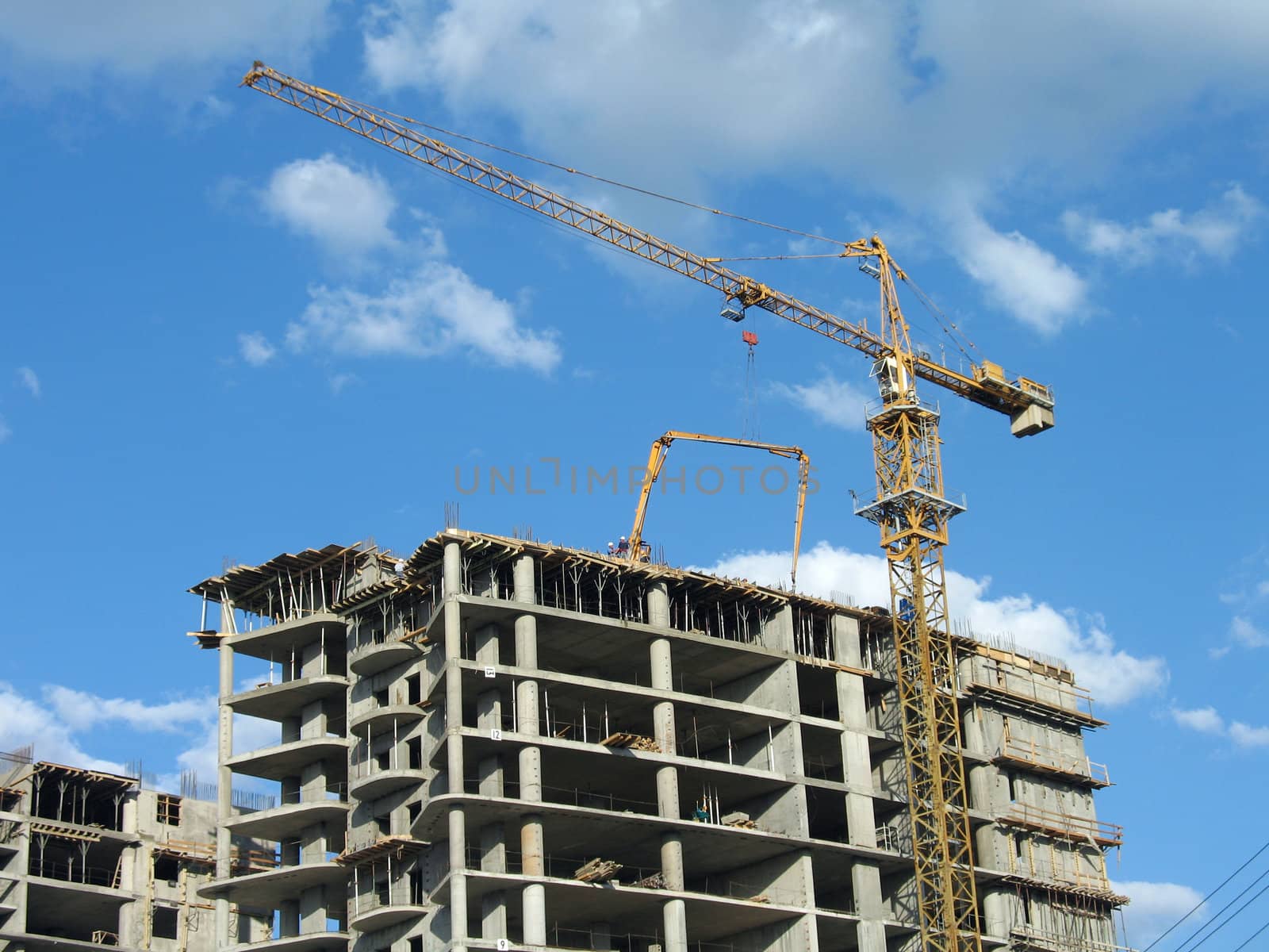 The yellow high-altitude crane on a building site in Volgograd, (look similar images in my portfolio)