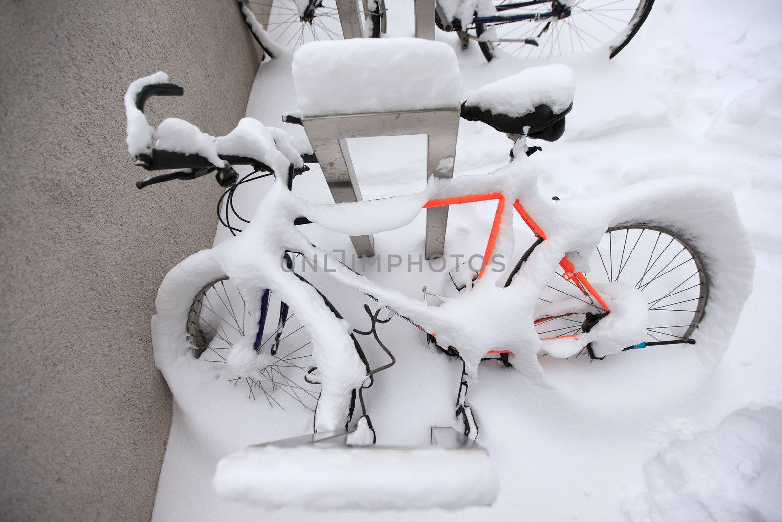 Mountain Bike Covered by a Lot of Snow by PixBox