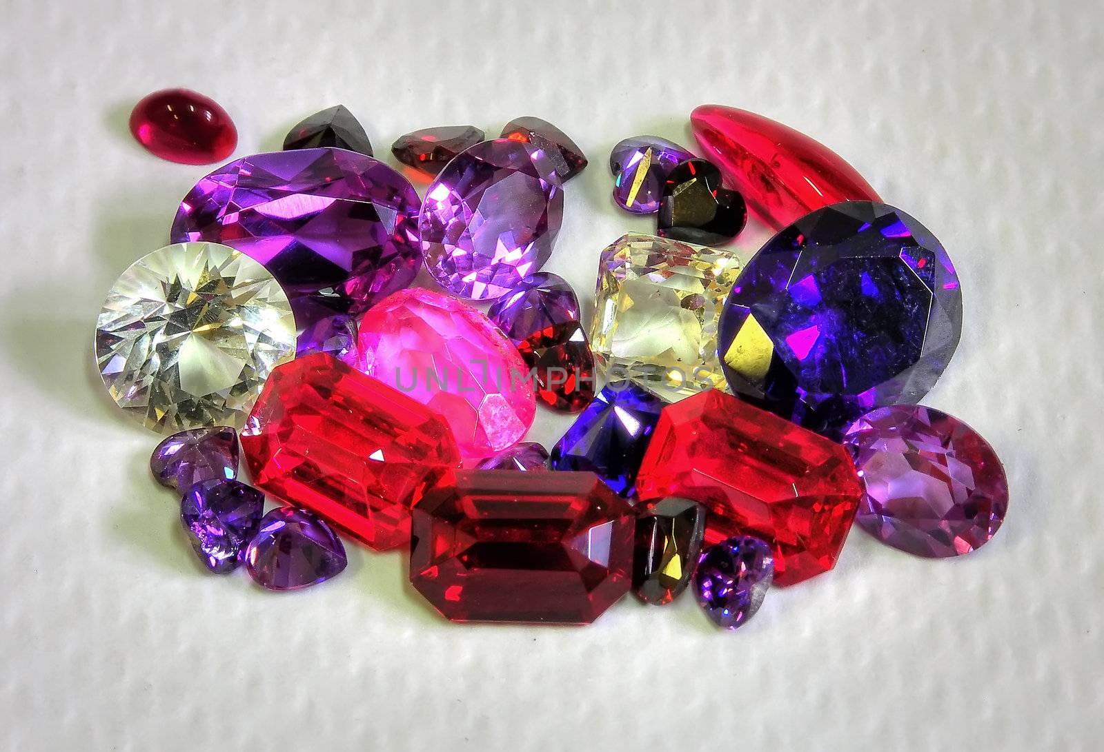 faceted stones on a white background