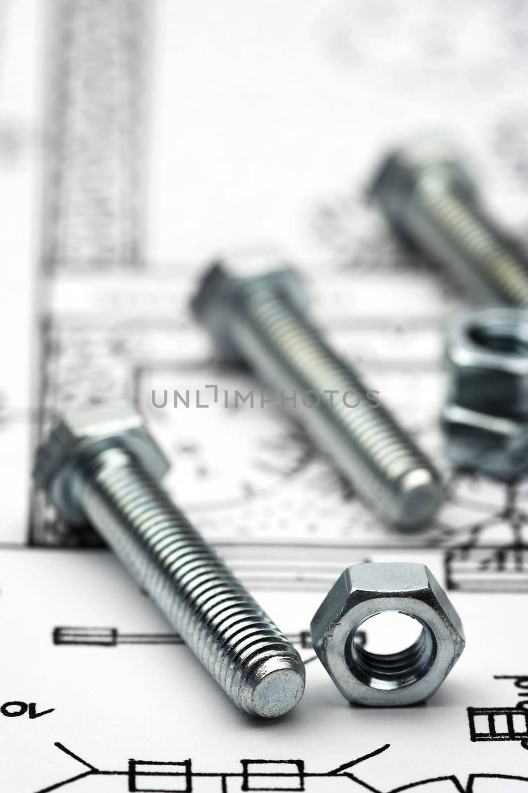 Nuts and bolts close up by alexkosev