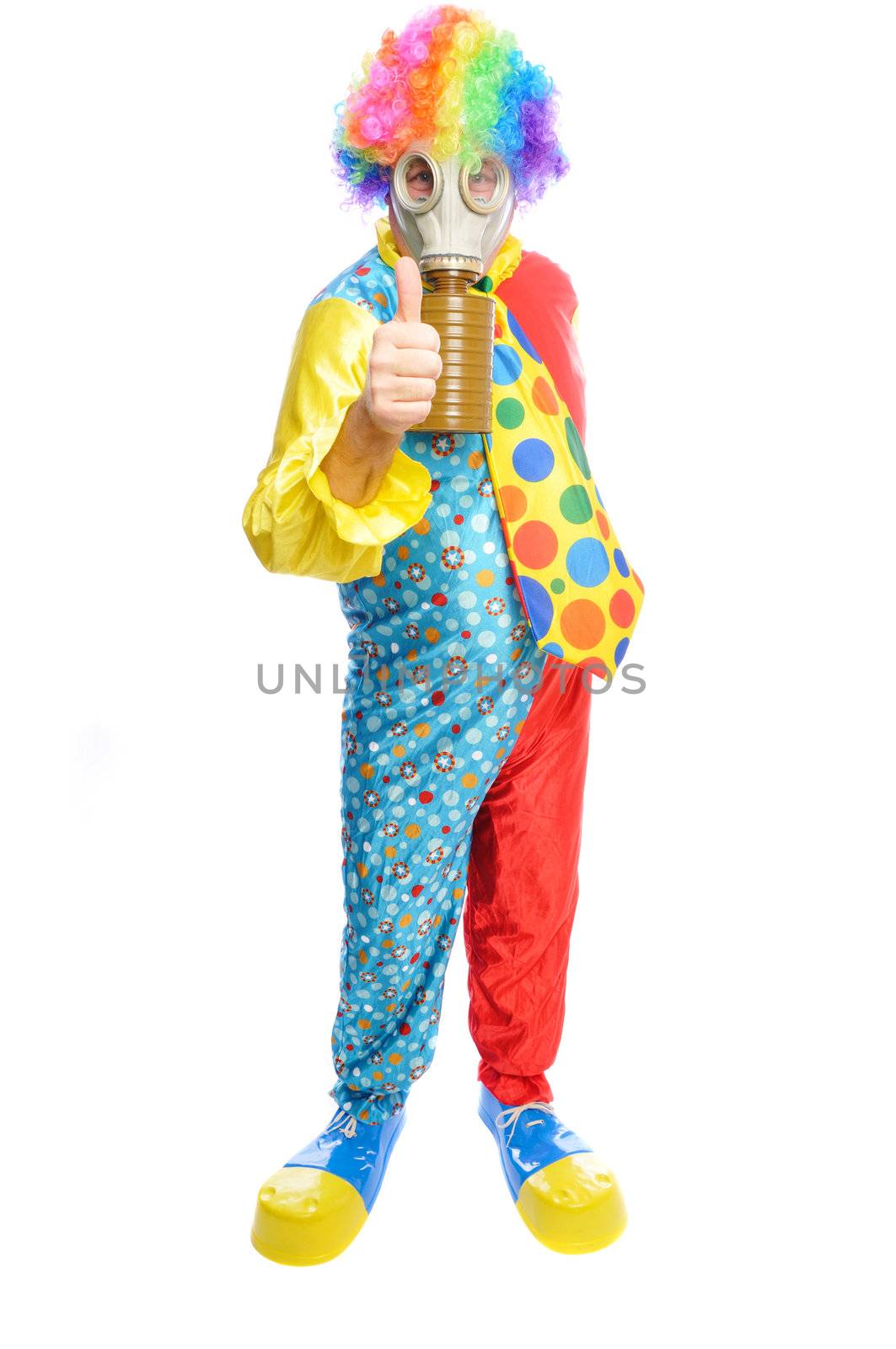 a man in a clown costume wearing a gasmask on a white background