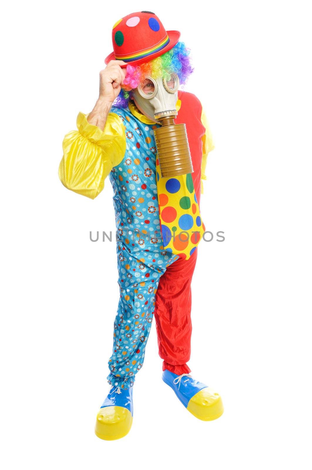 a man in a clown costume wearing a gasmask on a white background