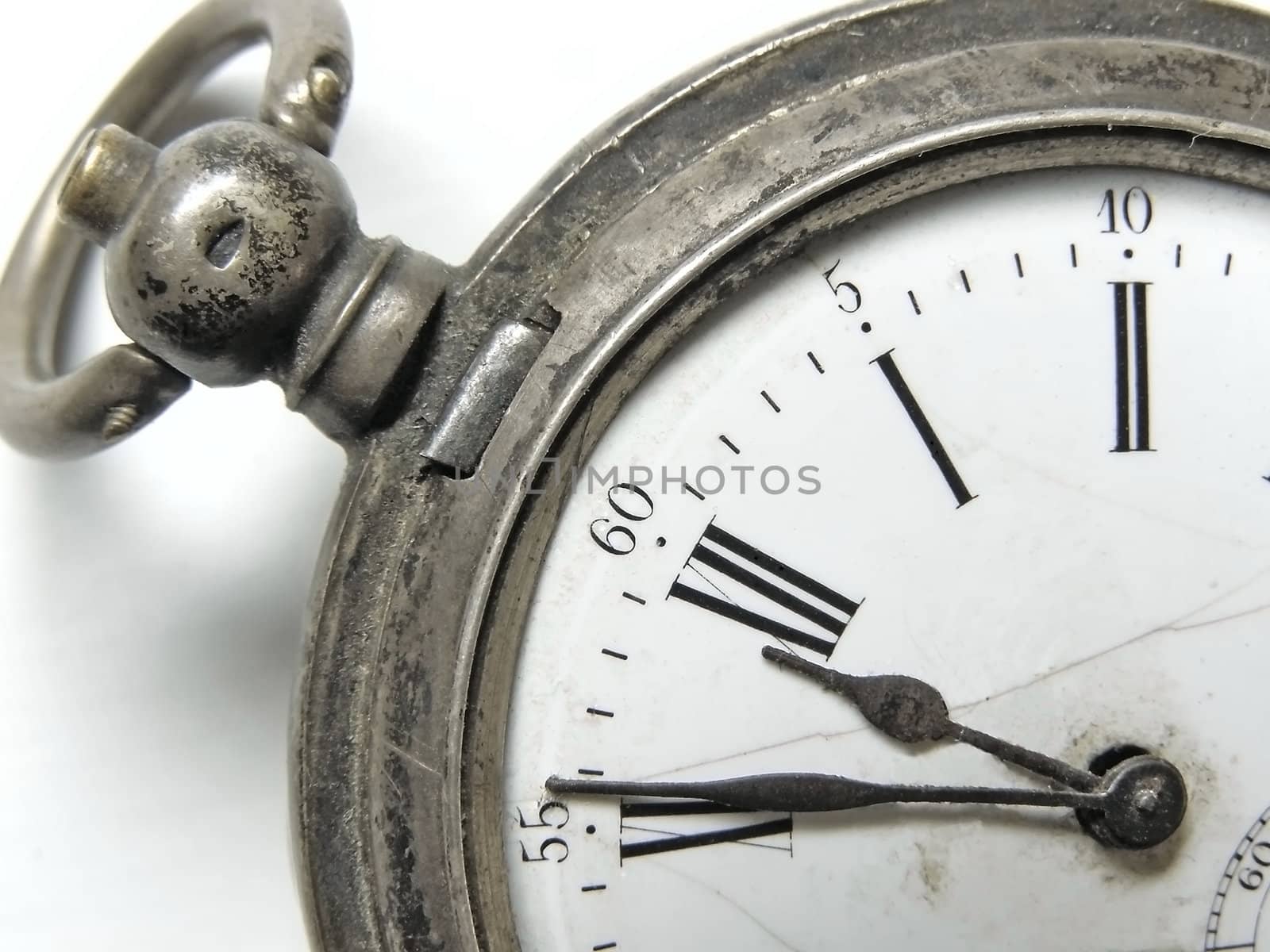vintage silver clock show five minute till twelve
