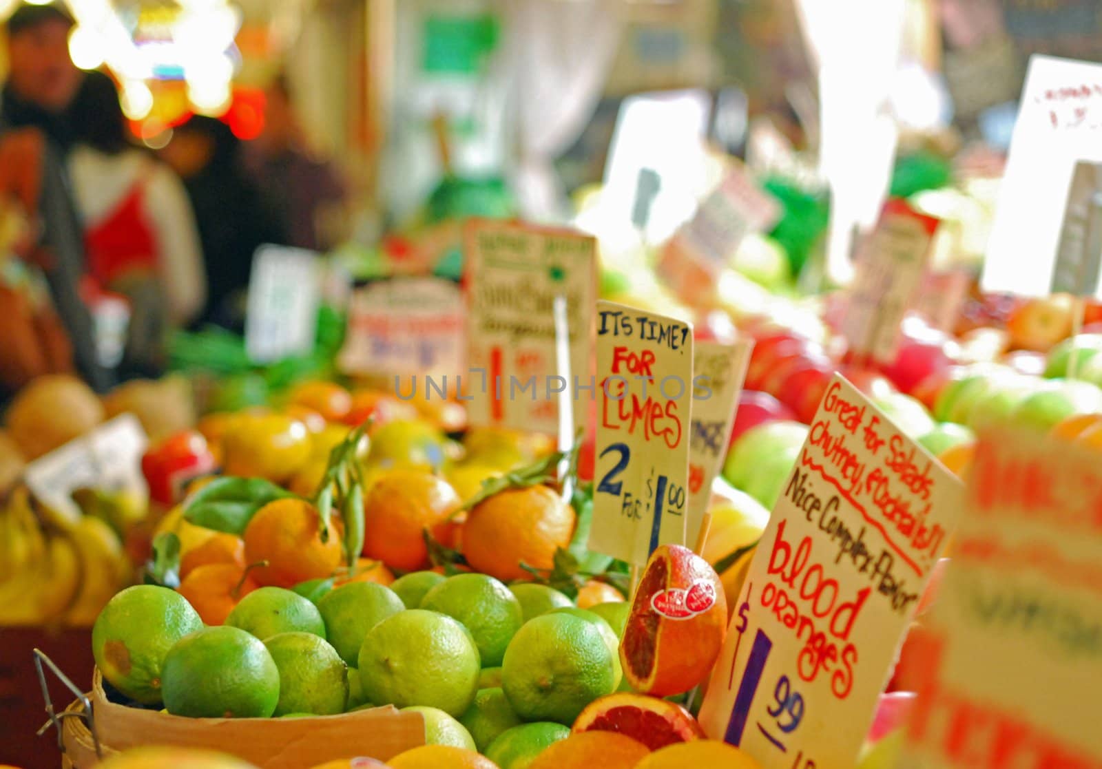 vegetables and fruits at the pike place market on a busy day