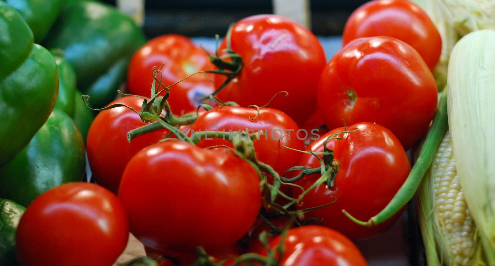 vegetables at the market, red juicy tomatoes close up