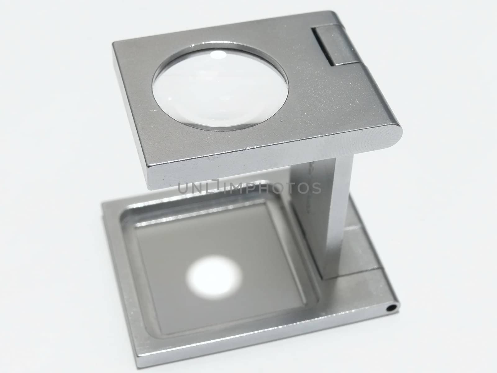 collapsible enlarging lens
