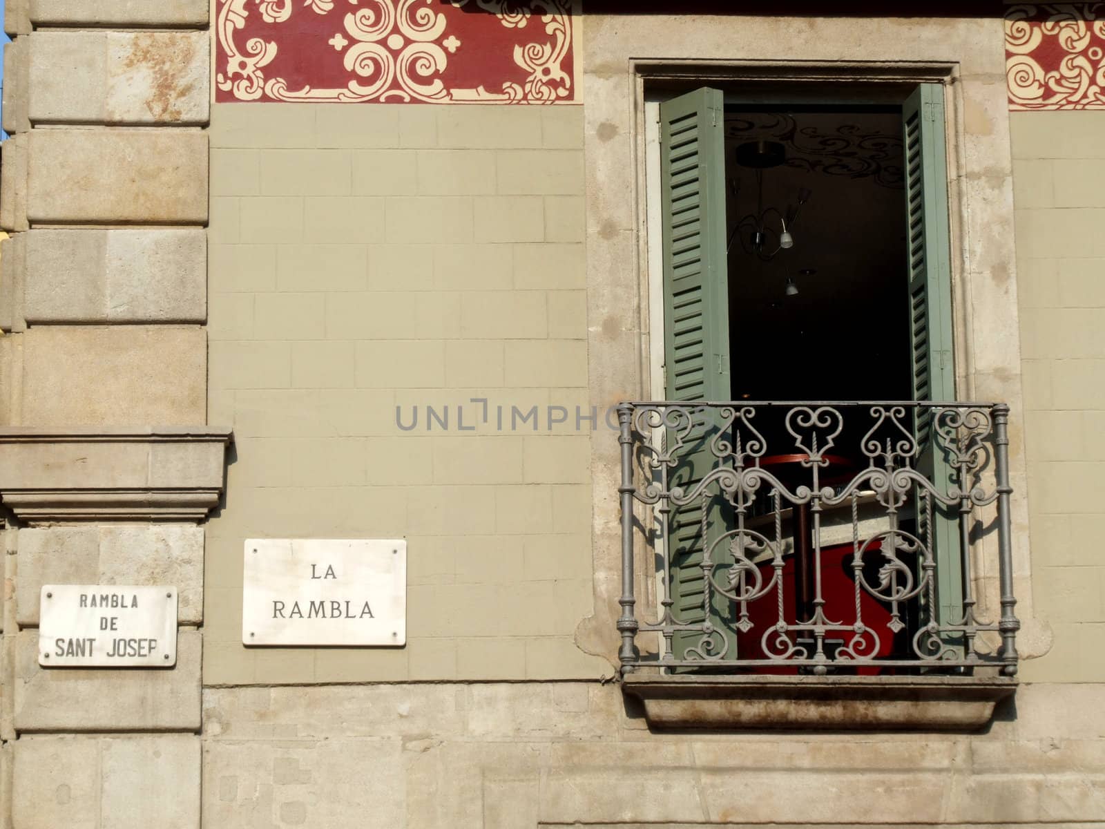 Beautiful old balcony door in Spain. Barcelona - La Rambla architecture.