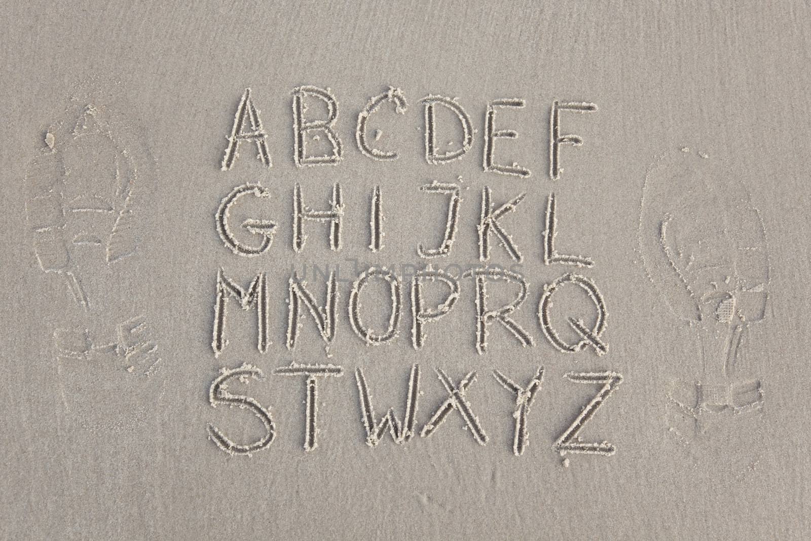 Alphabet on sand