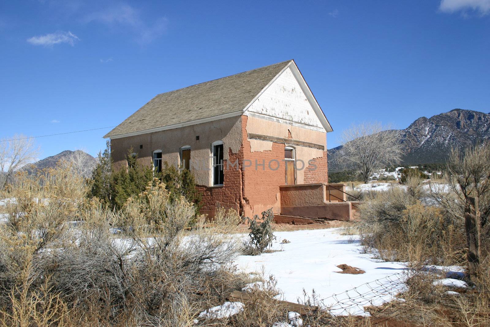 Historic adobe schoolhouse once used to education children of pioneers in rural Colorado