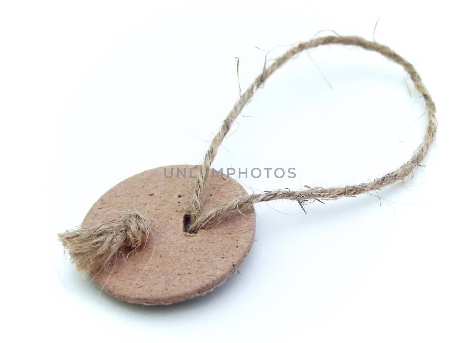 label tag with string on the white table