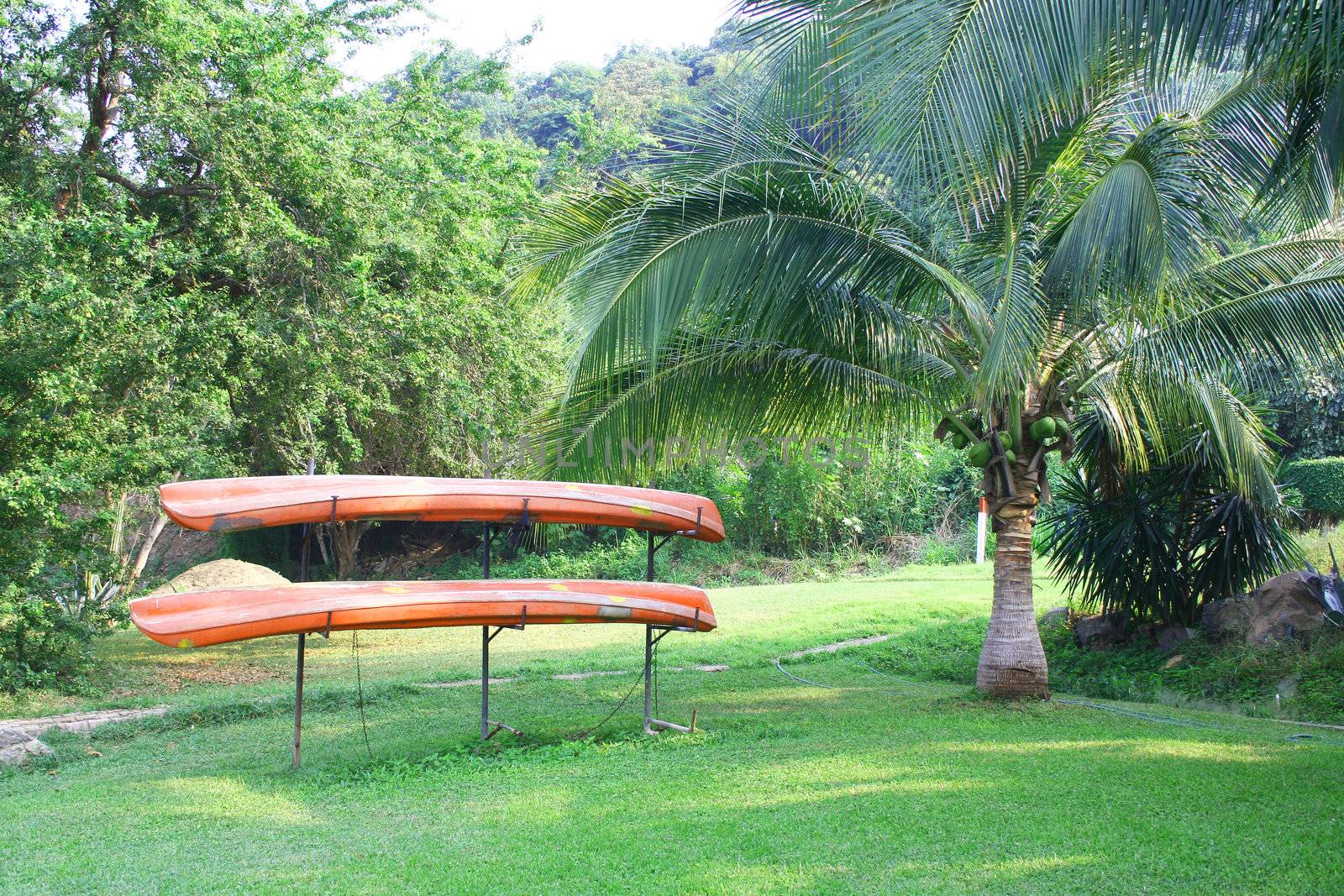 Sea Kayaks on rack at resort