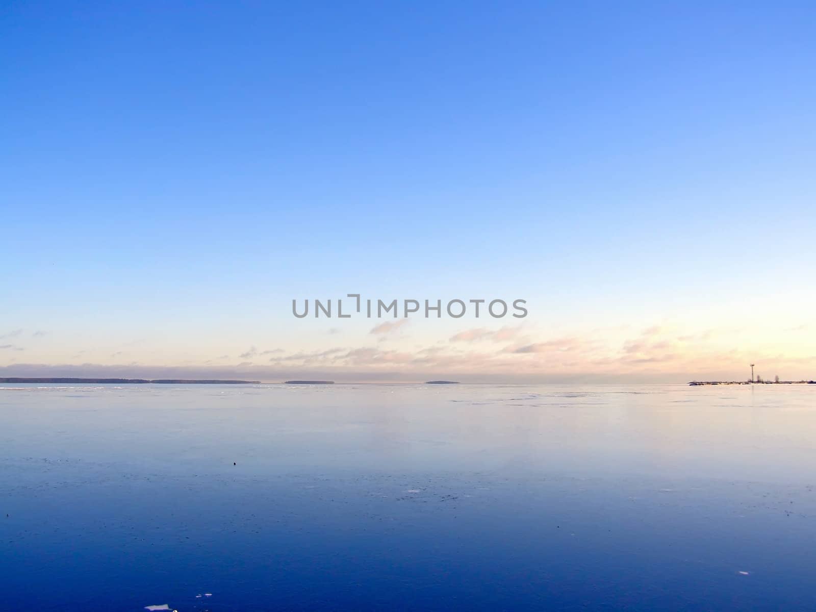 Tranquil water skyline with the blue sky 