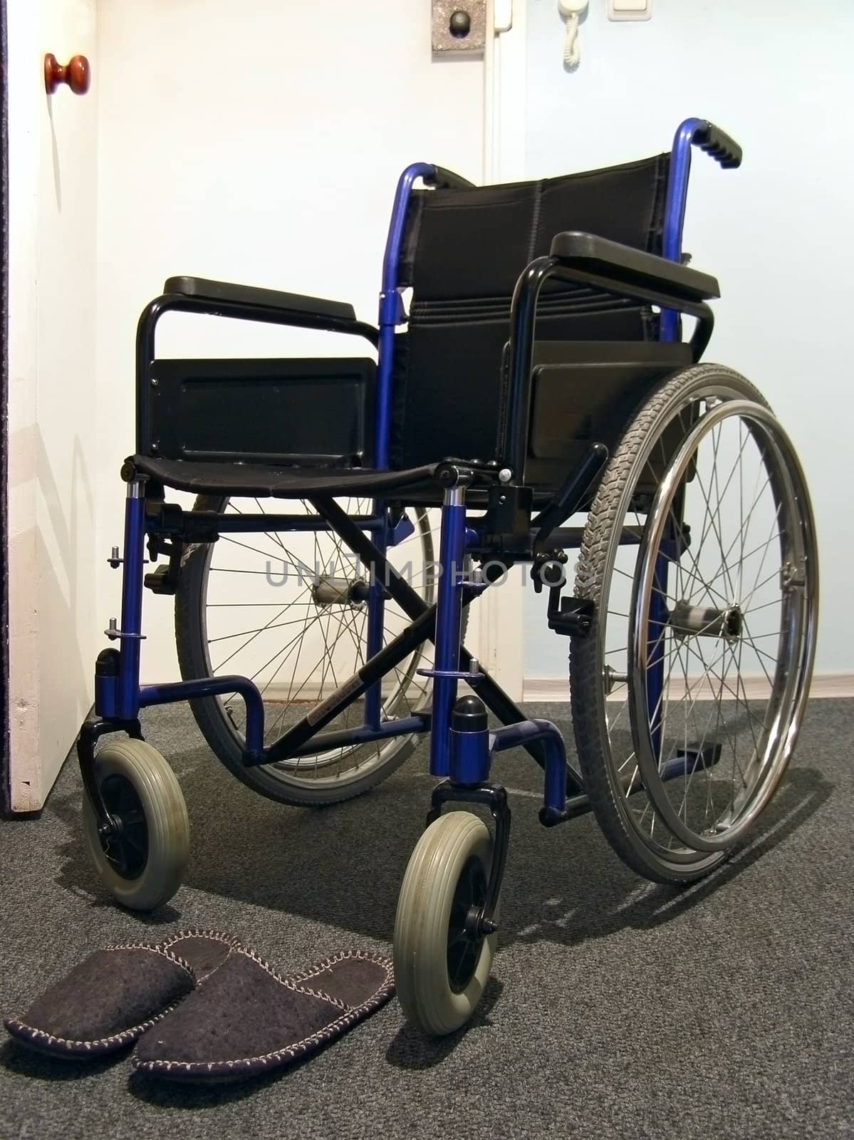 Single wheelchair with the sneakers in the hospital