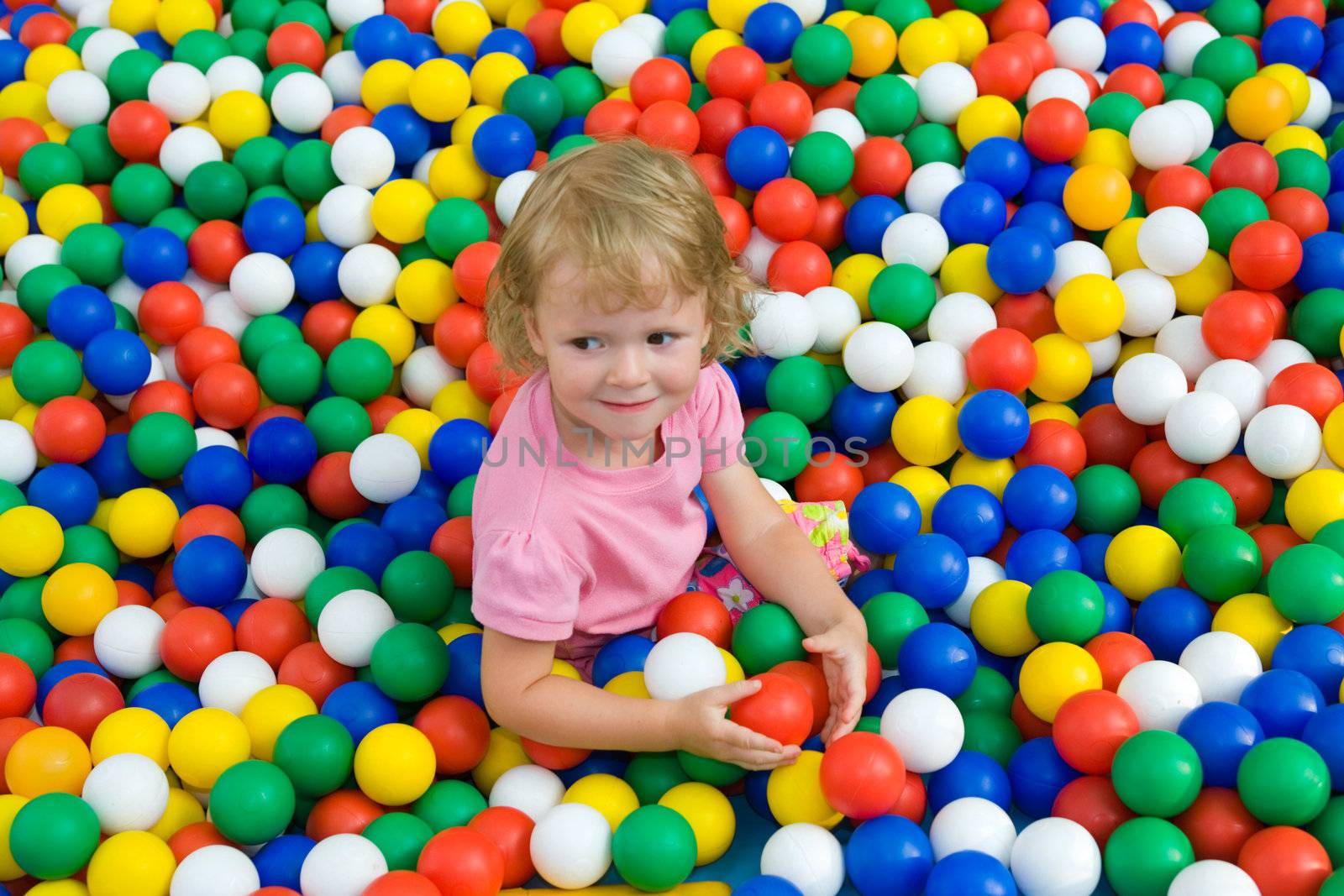 girl with varicoloured balls