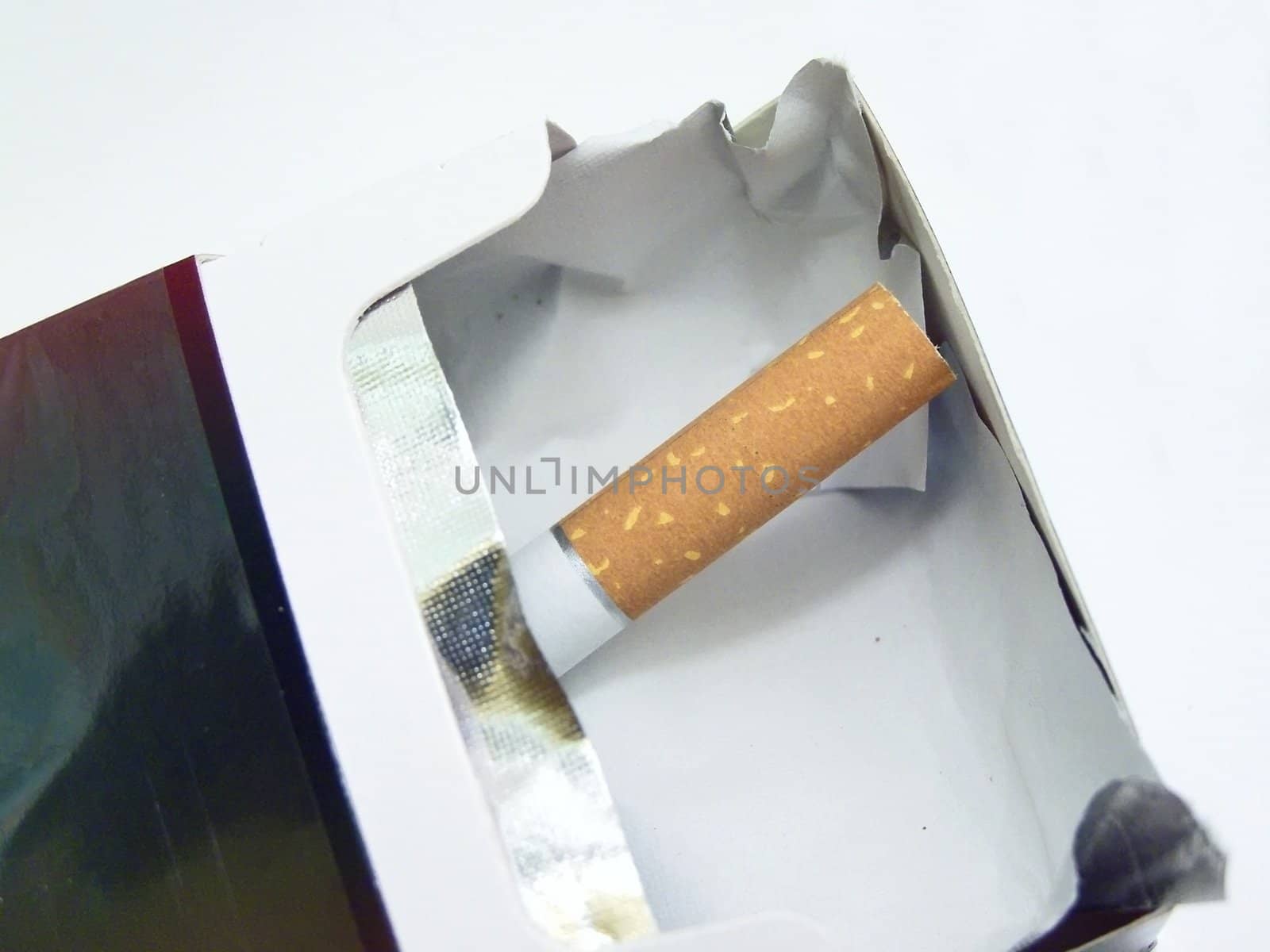 The last cigarette in the empty cigarette box