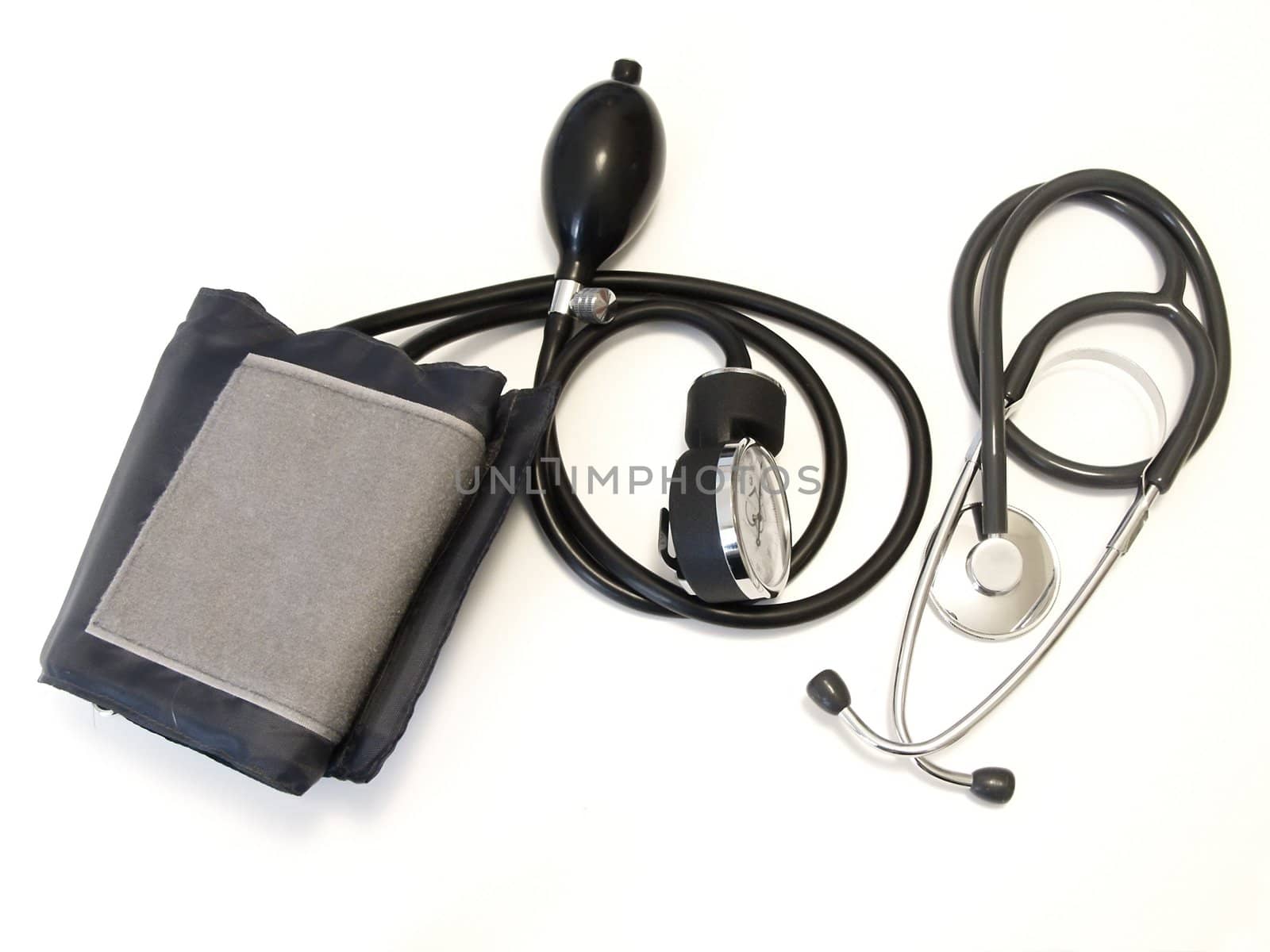 The medical manometer with stethoscope against white background