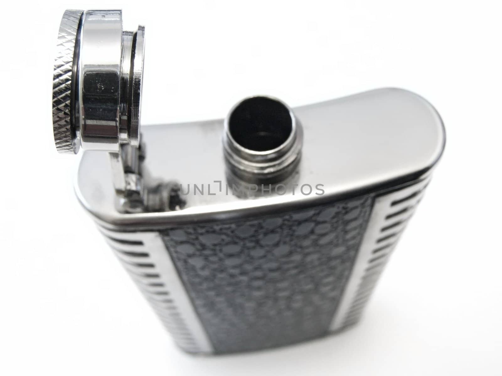 metallic open flask against the white bacground