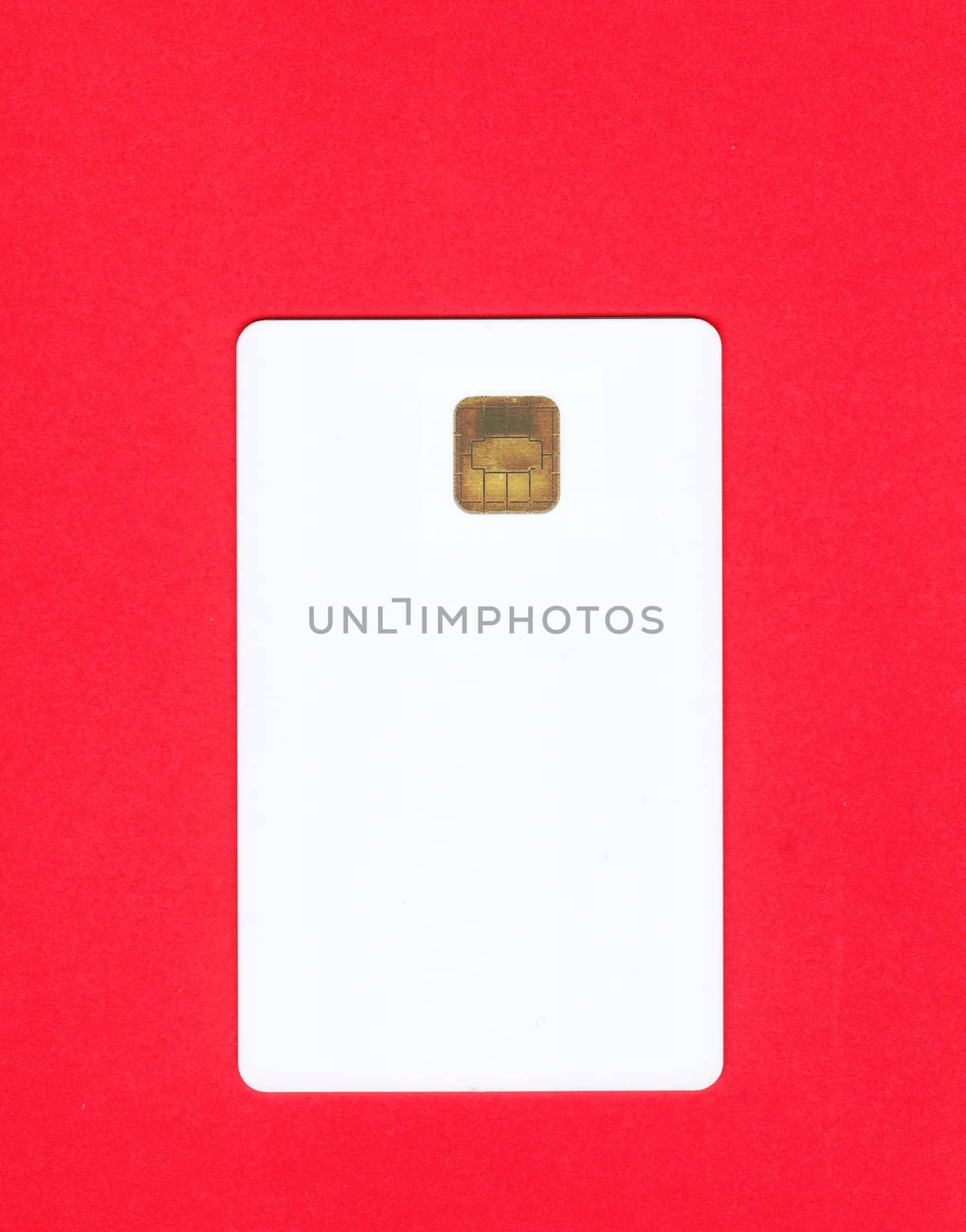 Empty white credit card on red background